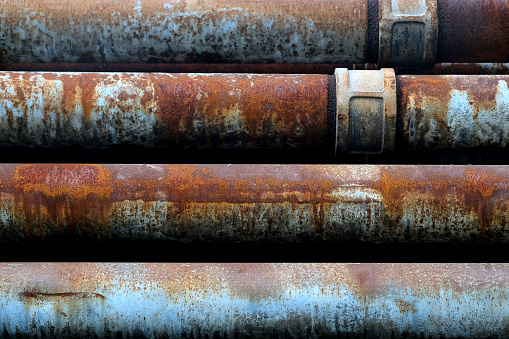 Close up. The old rusted steel pipes.