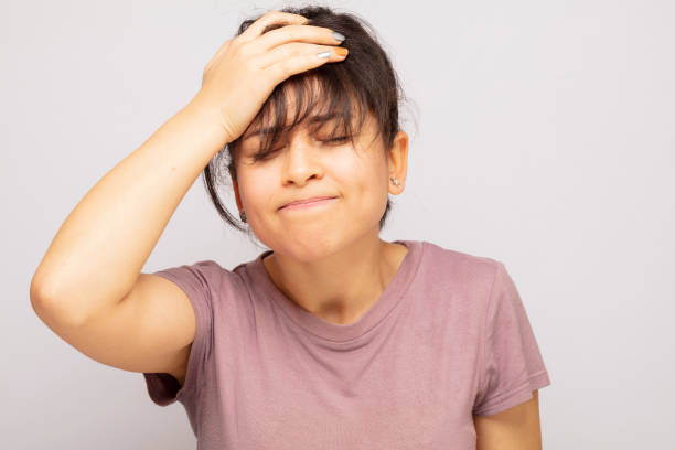 istock Young woman has a headache 1225381890