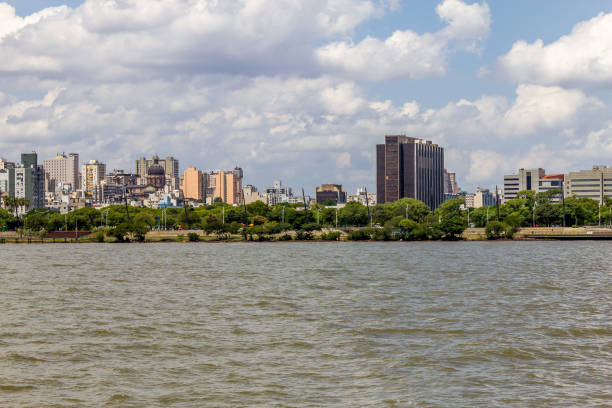 istock Guaiba shore with trees and buildings 1225382059