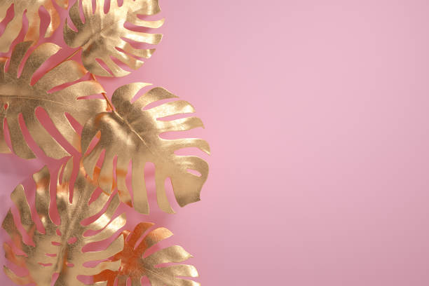 istock Gold tropical palm leaves 1225383284