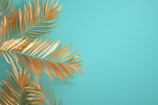 Gold tropical palm leaves