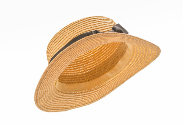 istock Straw hat with black bow isolated on white 1225385032