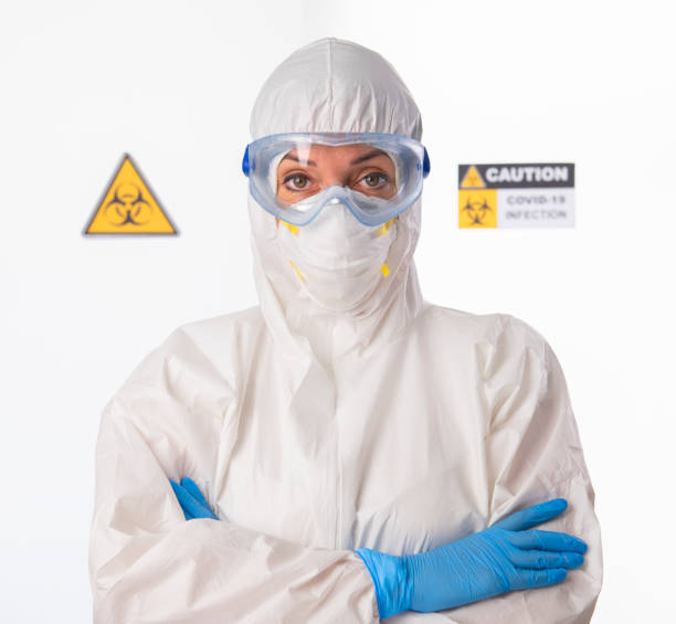 istock Doctor wearing highly protective suit during coronavirus COVID 19 novel corona virus outbreak 1225390717