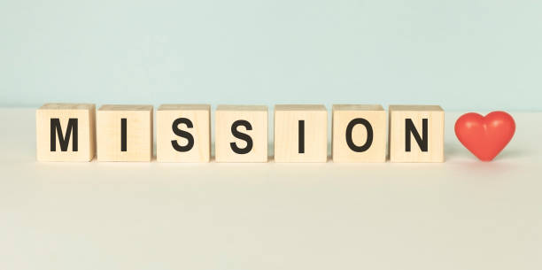 istock Wooden cubes with word MISSION on a light background 1225390761