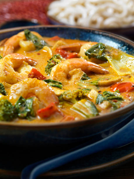 Shrimp Curry Soup with Thick Noodles and Vegetables