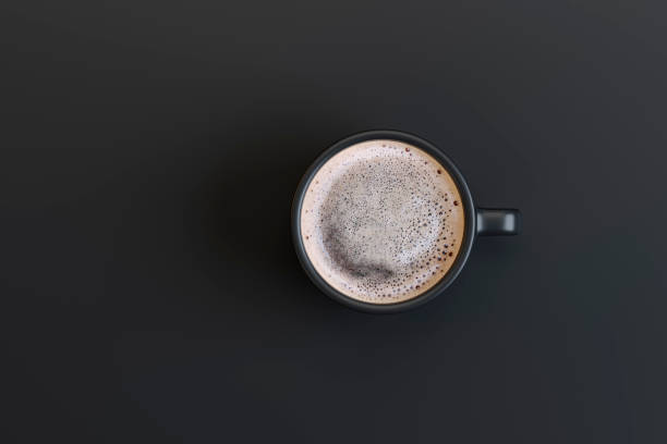 istock Black cup of dark coffee on a black background, minimal concept 1225391034