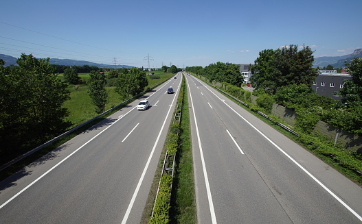 Koblach, Vorarlberg, Austria, 2020. Cars drivin on the highway through the Rheintal connecting Bregenz and Feldkirch.