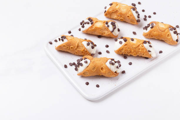 istock Sicilian dessert cannoli with chocolate 1225401372