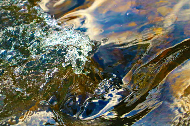 istock River Running through rocky section in the sun 1225403679