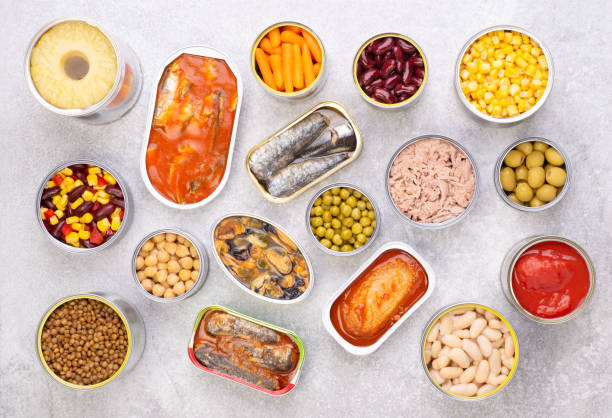 istock Canned food on gray background background 1225404431