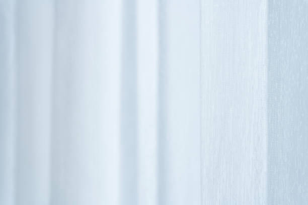 istock Transparent curtain that scatters the light. Fabric texture 1225410571