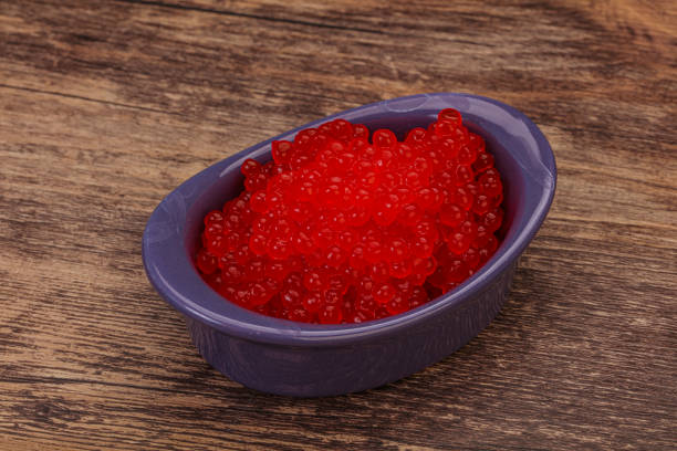 istock Red salmon caviar in the bowl 1225411362