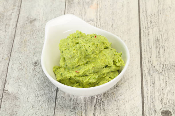 istock Avocado guacamole sauce with chili pepper 1225411424