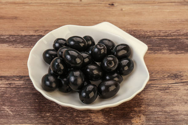 Marinated Black olives in the bowl