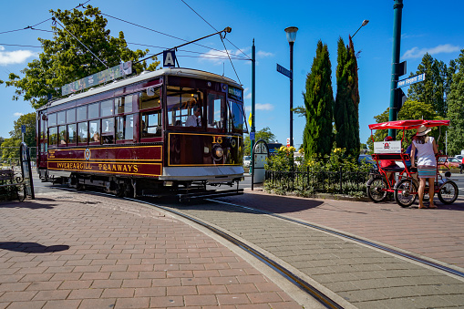 Budapest, Hungary - August 18, 2023: A tram runs along a street in Budapest downtown.