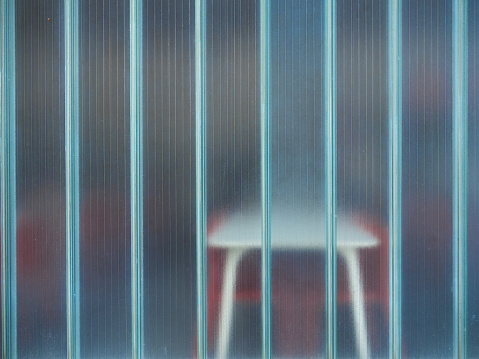 A table seen through a translucent window with vertical lanes