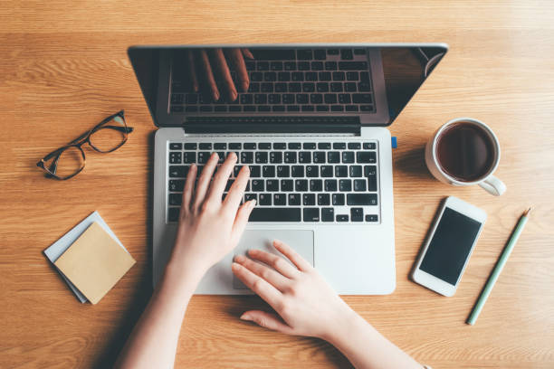 istock Young woman working in a home office. 1225417435