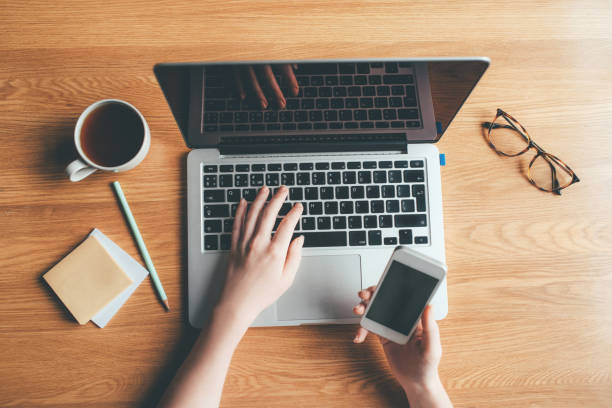 istock Young woman working in a home office. 1225417436
