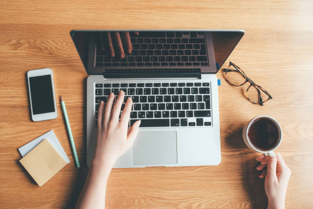istock Young woman working in a home office. 1225417438
