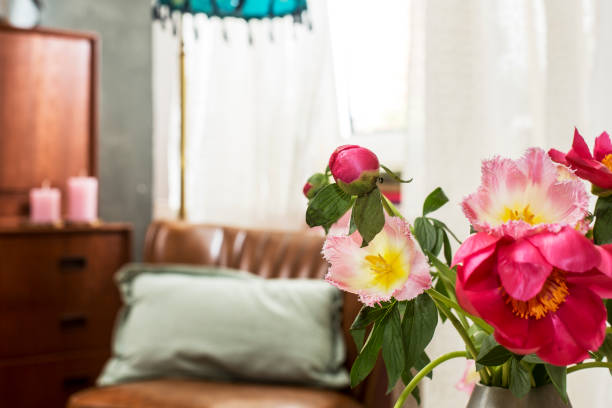 istock Cozy place with flowers and candles 1225420034