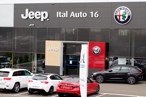 Bordeaux , Aquitaine / France - 10 27 2019 : Alfa Romeo and Jeep car logo sign shop showroom store Italian american brand of automotive