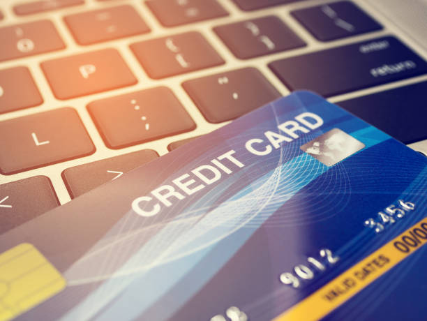 istock Credit card close up with keyboard, Shopping online concept. 1225423507