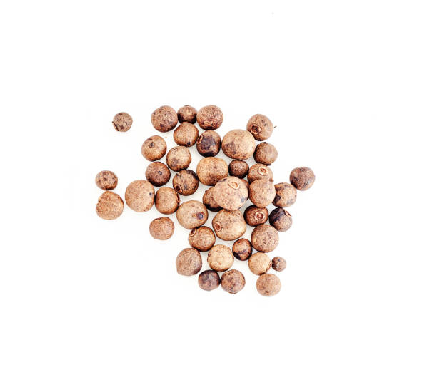istock Small pile of black pepper isolated on white background. 1225425218