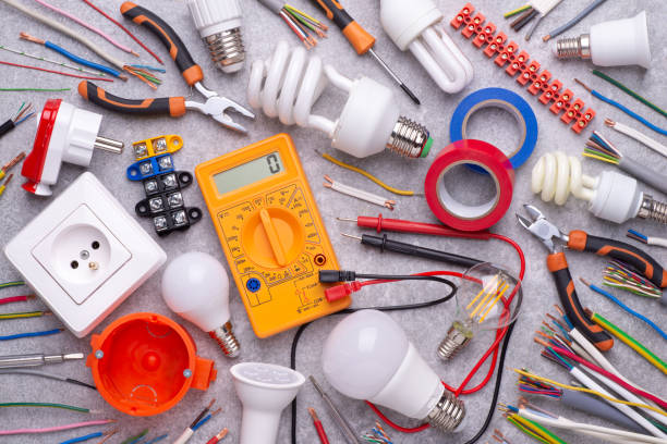 istock Electrician equipment on silver background, top view 1225428773