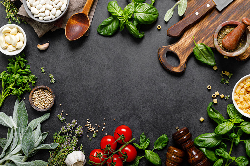 Culinary background with ingredients for cooking, herbs and spices