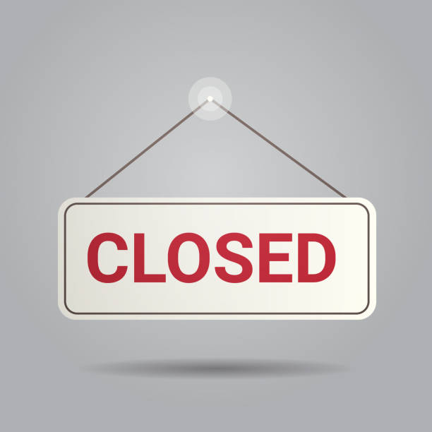 istock closed sign hanging outside business office store shop or restaurant 1225432120