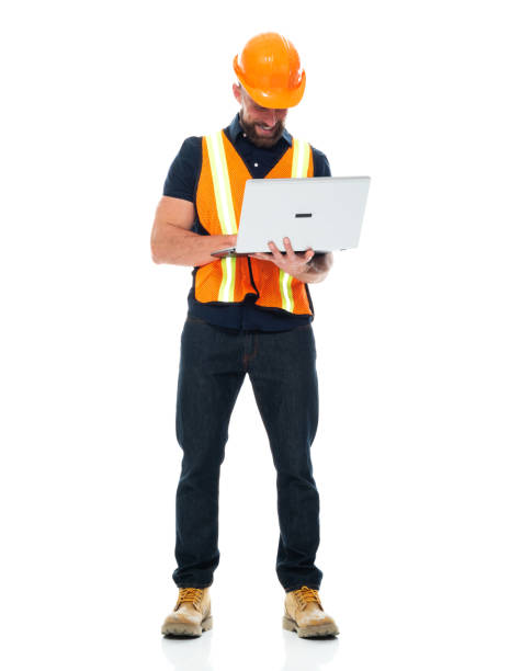 istock Technician repairing wearing shirt and holding hammer and using computer 1225432586