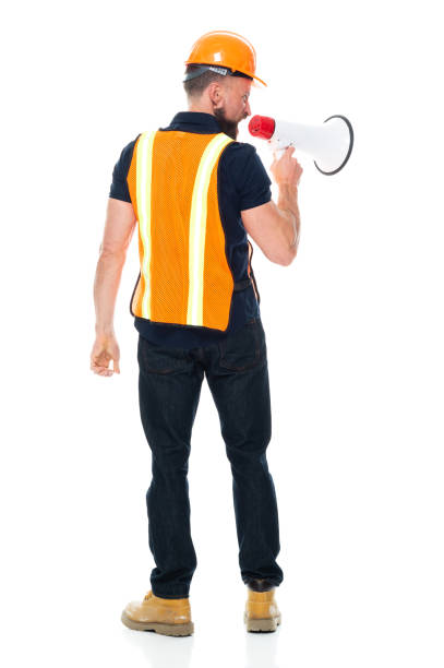 istock Construction worker repairing wearing boot and holding megaphone 1225432594