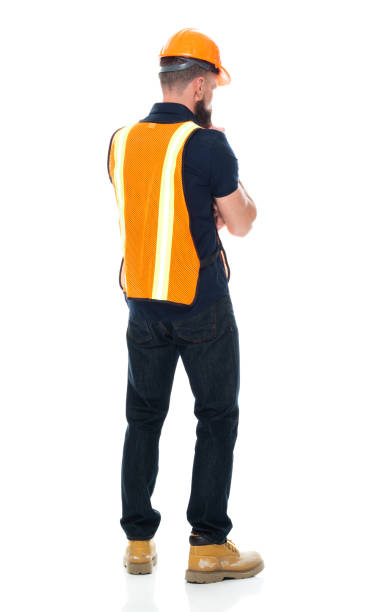 istock Construction worker standing wearing shirt and holding hammer 1225432686