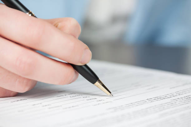 istock Business woman signing contract 1225433301