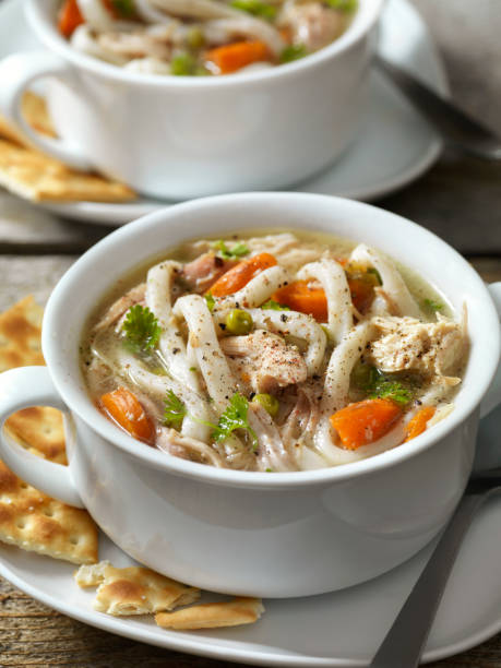 istock Home Made Chicken Soup with Thick Noodles and Crackers 1225433524