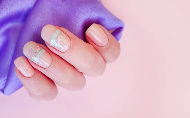 istock female hand nail beautiful manicure silk 1225433676