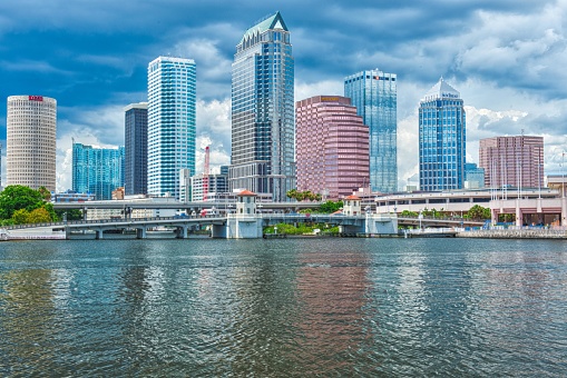 Skyline of Tampa, Florida. Distant view of Downtown Tampa over the Hillsborough River and big transport junction.