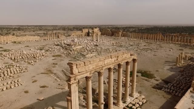 Ruins of the Temple of Bel of Palmyra in Syria. The ancient building is destroyed after the syrian civil war - aerial view with a drone