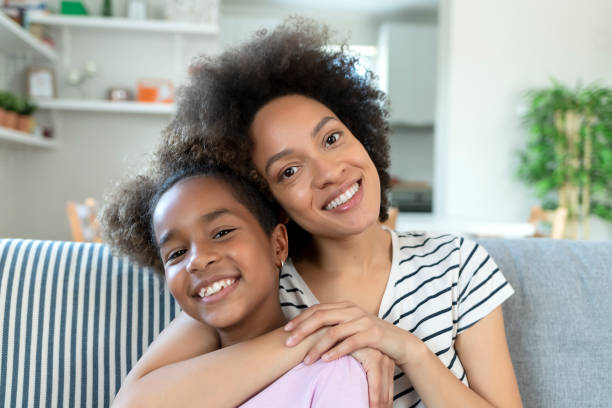 istock Safe in her Mom's embrace 1225450455