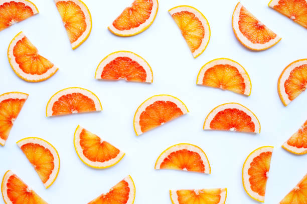 istock High vitamin C. Juicy grapefruit slices on white background. 1225451637