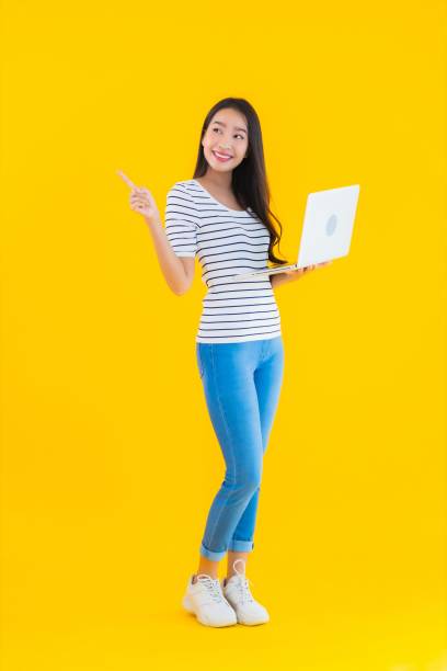istock Portrait beautiful young asian woman use laptop or notebook 1225456178