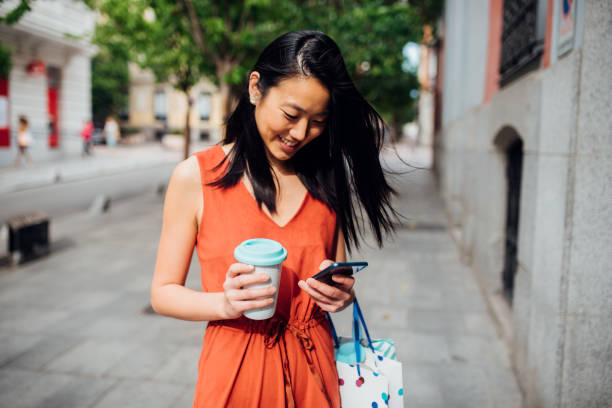 istock Girl on vacation, shopping and using smartphone 1225457933