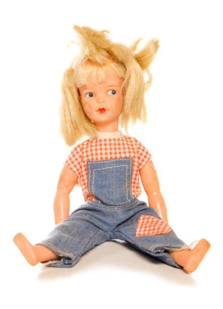 vintage doll isolated on a plain white background
