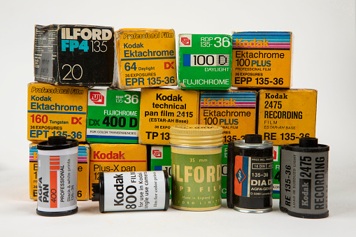 Sao Paulo, Brazil - may 10, 2020 - Old 35mm (type 135) photo film collection. Different branded professional photofilm in boxes and reel