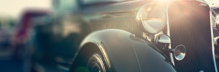 Classic car headlights close-up, vintage color