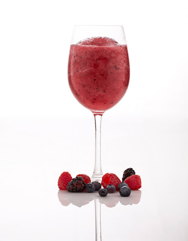 A glass of frozen berry Sangria