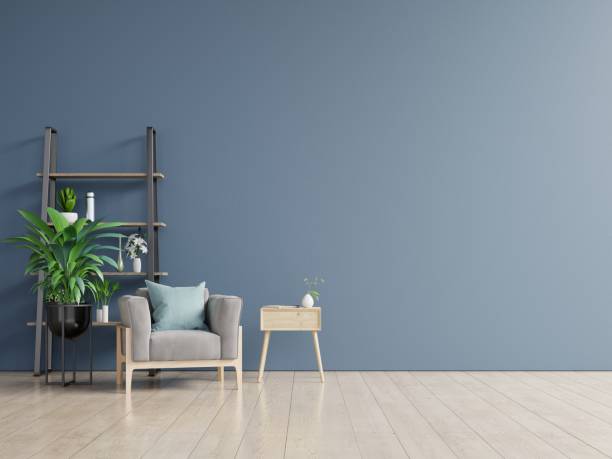 istock The interior has a armchair on empty dark blue wall background. 1225470381