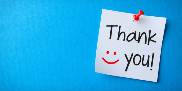 istock White Sticky Note With Thank You And Red Push Pin On Blue Background 1225472637