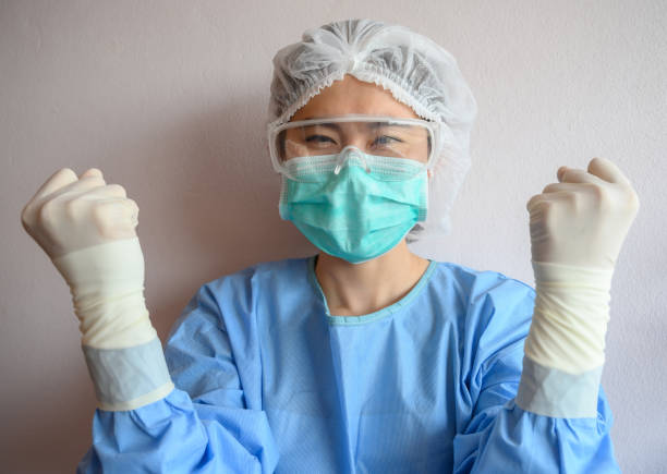 istock Nurse wearing scrubs with mask for protect virus before surgery operation. 1225481412