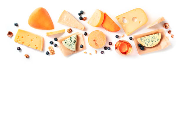 istock Cheese and wine design template, tasting and pairing, a flat lay on a white background with a place for text. Various cheeses, shot from above 1225488503